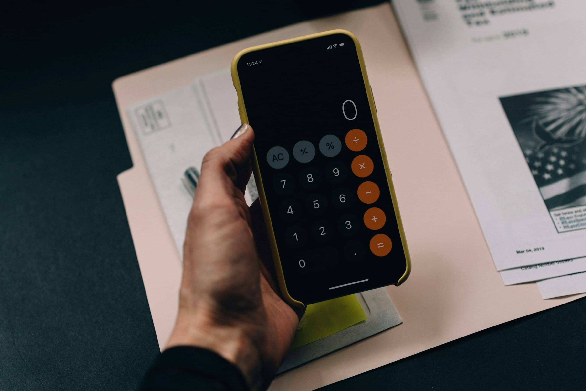 Business managers reviewing online payment processing, invoices, and transaction reporting